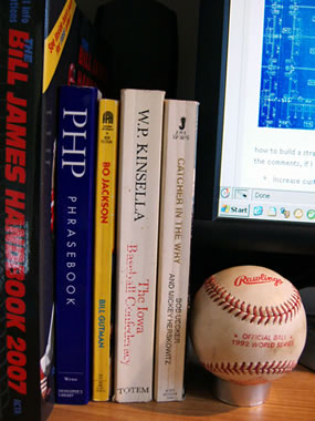 My 1992 World Series game ball flanked by baseball books